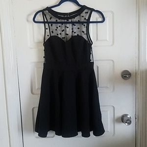 Cute black dress with polka dotted mesh